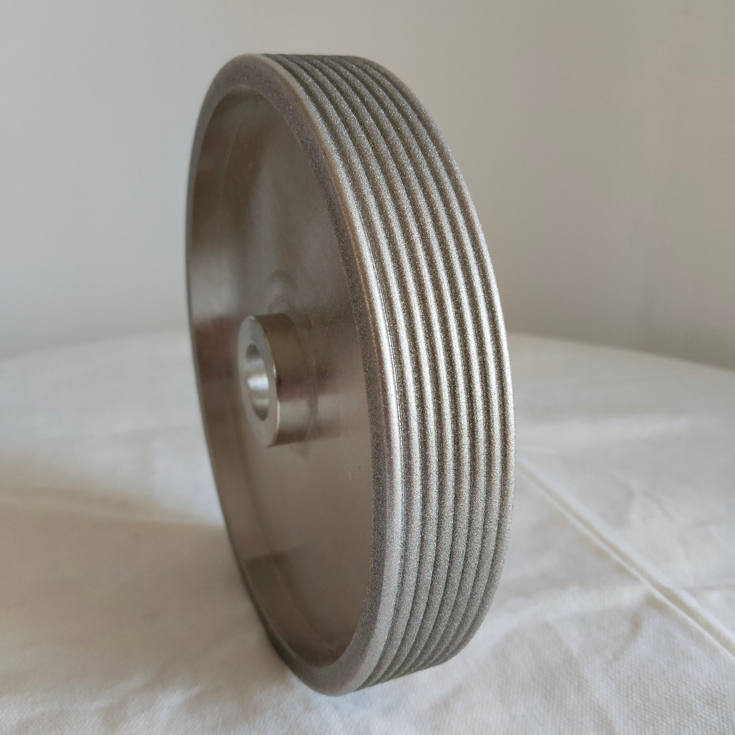 RADIUSED SERRATION WHEEL FOR KNIFE