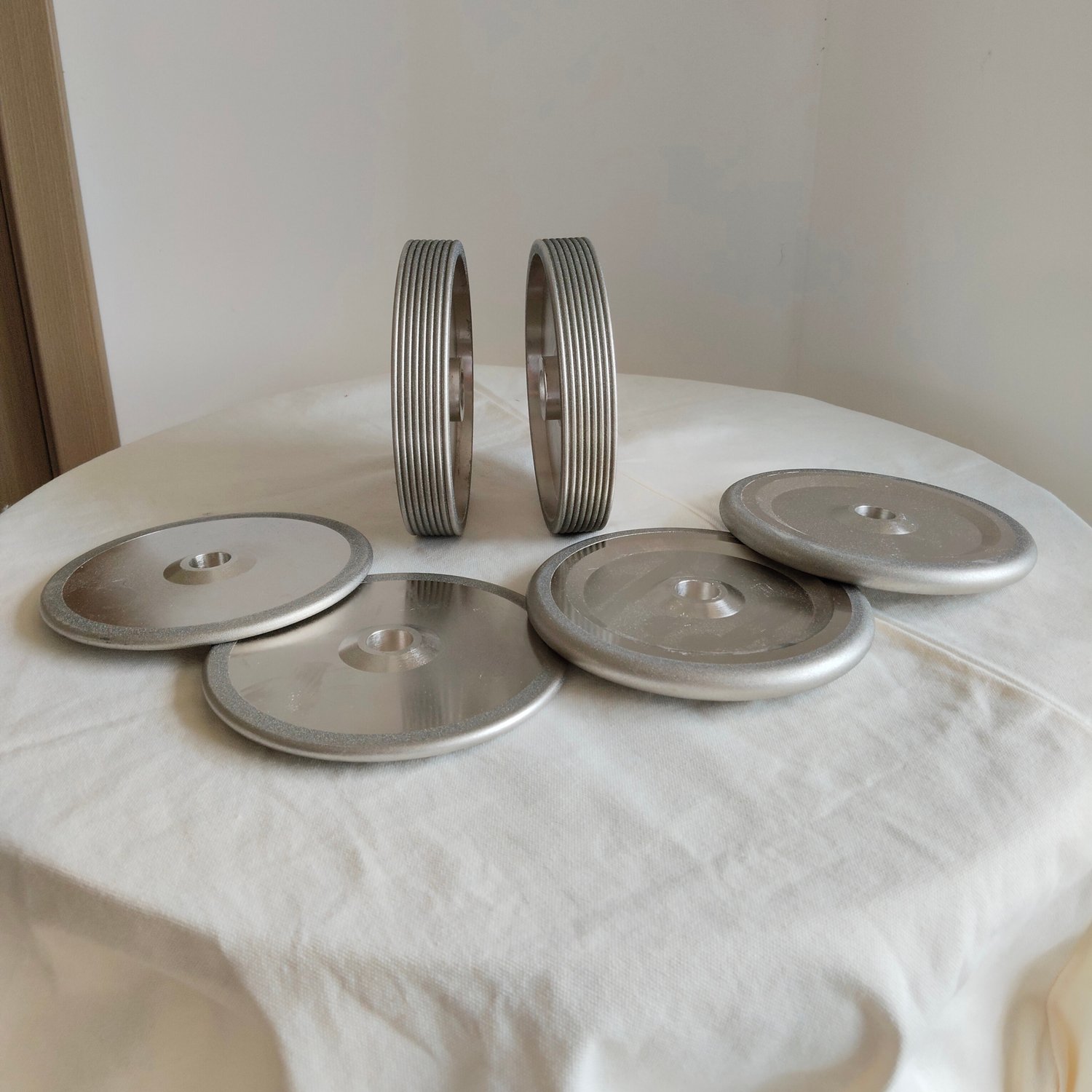 RADIUSED SERRATION WHEEL FOR KNIFE
